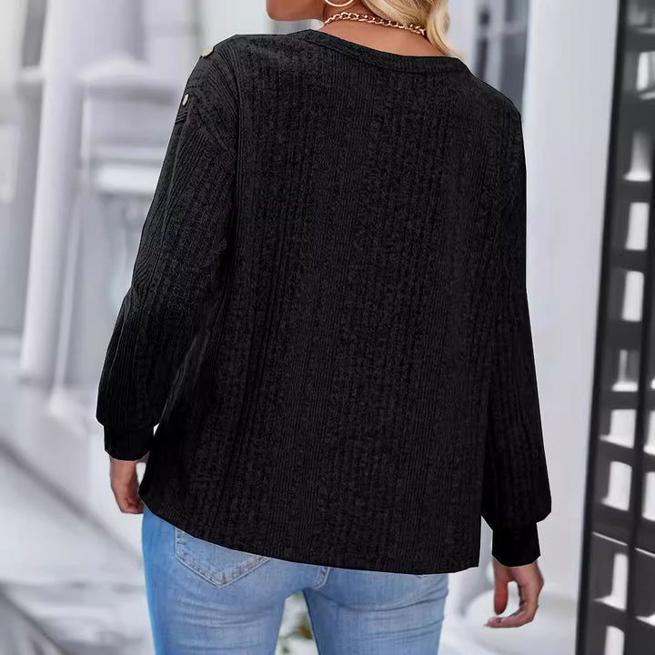 Damer Stilig stickad topp med överlappande axlar och knappland detaljer Mirla-Eva Jonsson