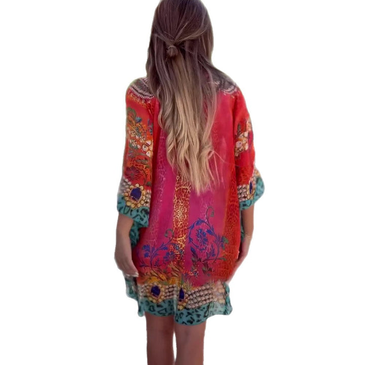 Damer Strandklänning med färgglad blommig tryck och V-urringning Eva Jonsson-Eva Jonsson