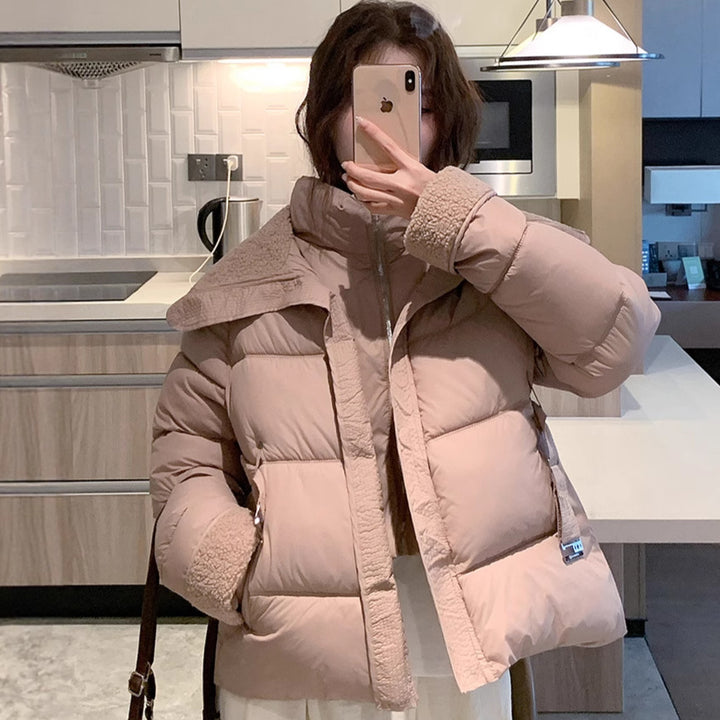 Damer Stylish och varm pufferjacka med hög krage och praktiska fickor Mirla-Eva Jonsson