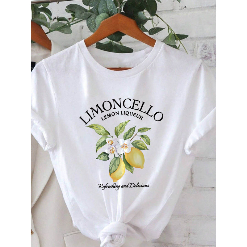 Damer T-shirt med fräsch limoncello-motiv och florala accenter Mirla-Eva Jonsson