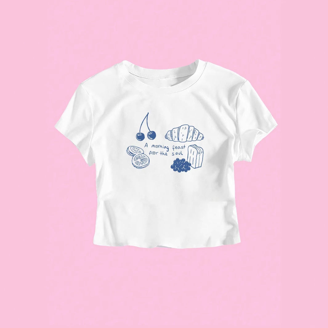 Damer T-shirt med kreativ frukostdesign Mirla-Eva Jonsson
