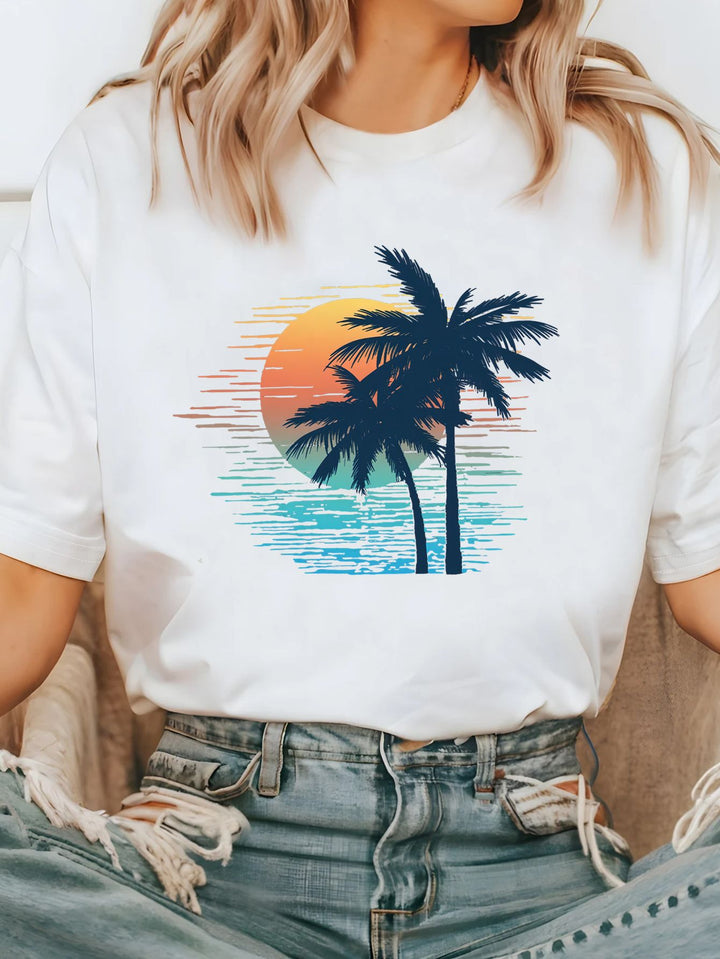 Damer T-shirt med kreativ grafisk tryck och lyxiga paljettaccentuer. Mirla-Eva Jonsson