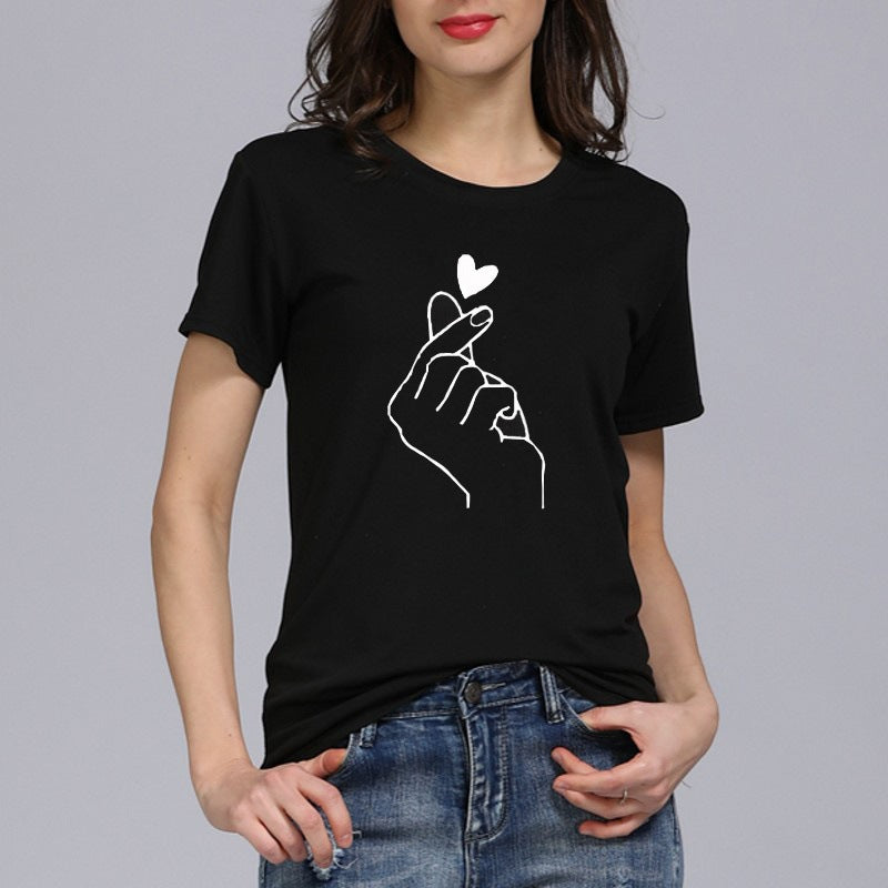 Damer T-shirt med kreativt hand- och hjärtmotiv Mirla-Eva Jonsson