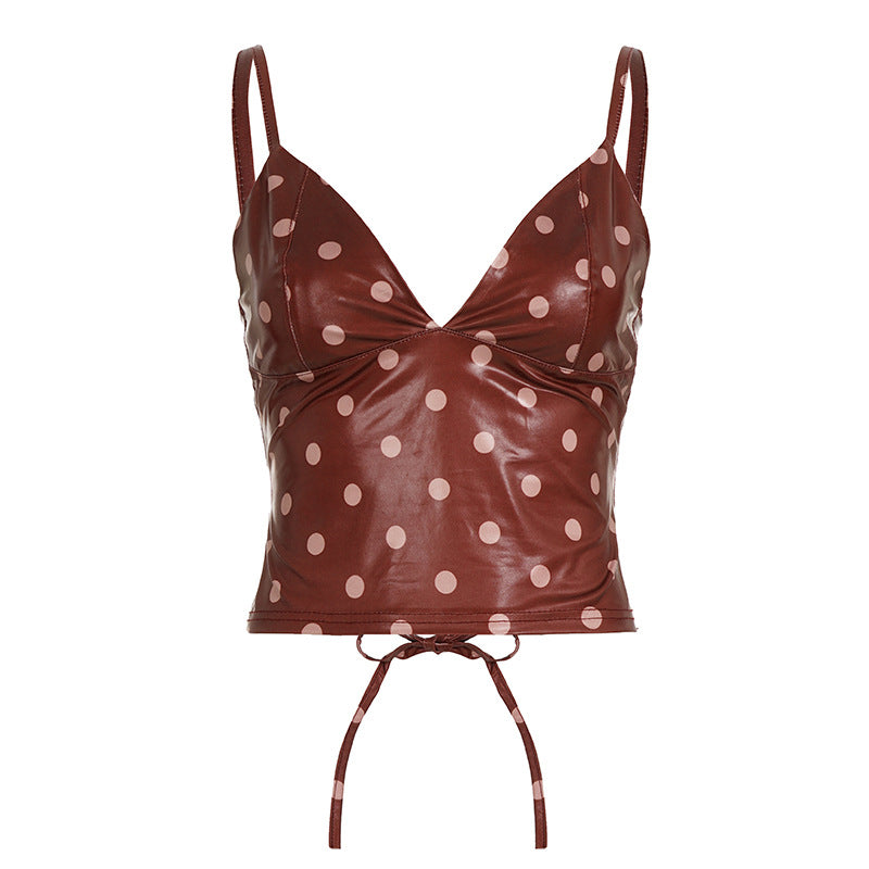 Damer Trendigt prickigt topp i konstläder Mirla-Eva Jonsson
