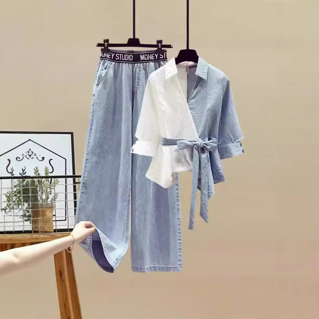 Damer Tvådelat set med lös, randig topp och vida jeansbyxor Mirla-Eva Jonsson