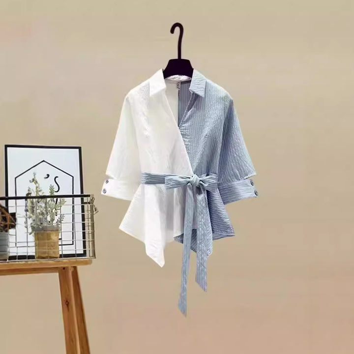 Damer Tvådelat set med lös, randig topp och vida jeansbyxor Mirla-Eva Jonsson