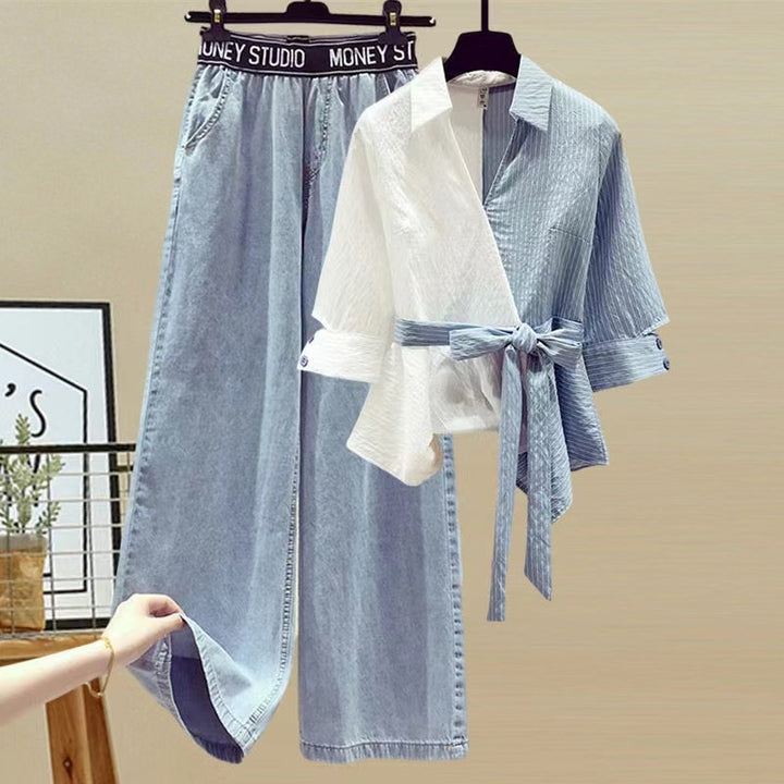 Damer Tvådelat set med lös, randig topp och vida jeansbyxor Mirla-Eva Jonsson