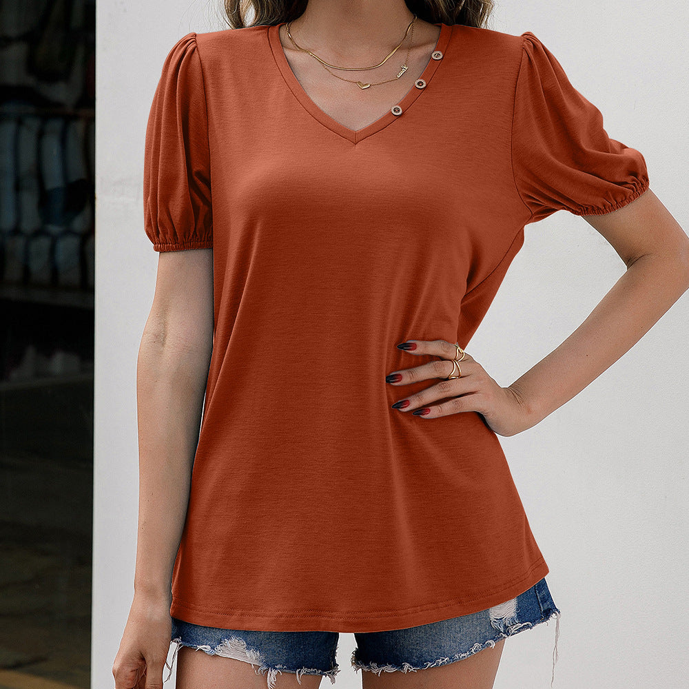 Damer V-ringad T-shirt med trendiga puffärmar och knapppdetaljer Eva Jonsson-Eva Jonsson