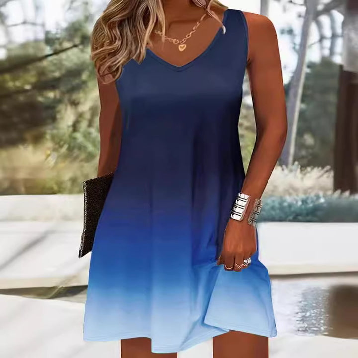 Damer V-ringad sommarklänning med livlig färgövergång och lätt, andningsbart tyg Eva Jonsson-Eva Jonsson