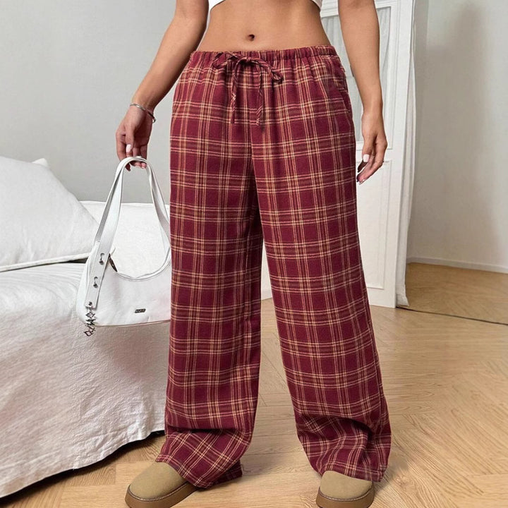 Damer Vid rutiga byxor med elastisk midja och praktiska fickor Mirla-Eva Jonsson