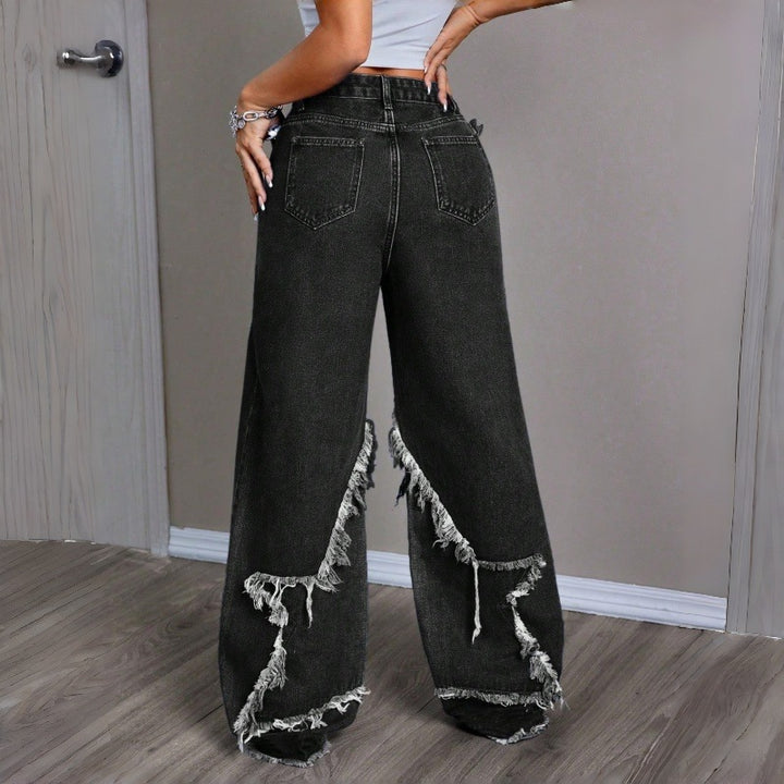 Damer Vida Jeans i modern förstörd stil med fransiga detaljer Mirla-Eva Jonsson