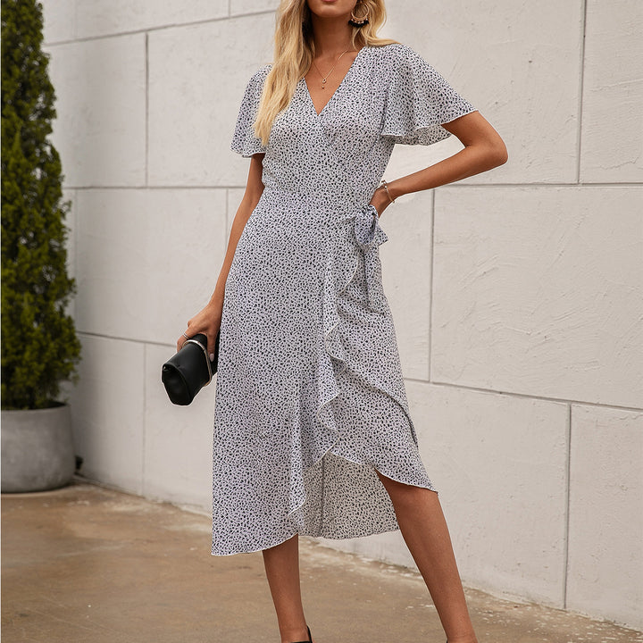 Damer Wrap-klänning med volangdetaljer och elegant silhuett Eva Jonsson-Eva Jonsson