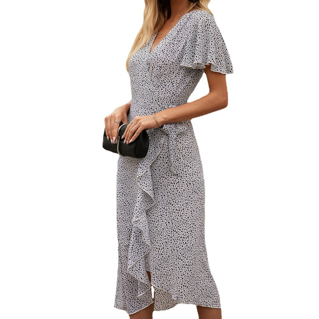 Damer Wrap-klänning med volangdetaljer och elegant silhuett Eva Jonsson-Eva Jonsson