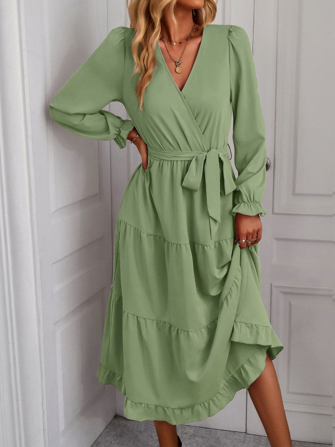 Damer Wrapklänning med Volangärmar och Elegant Snitt Mirla-Eva Jonsson