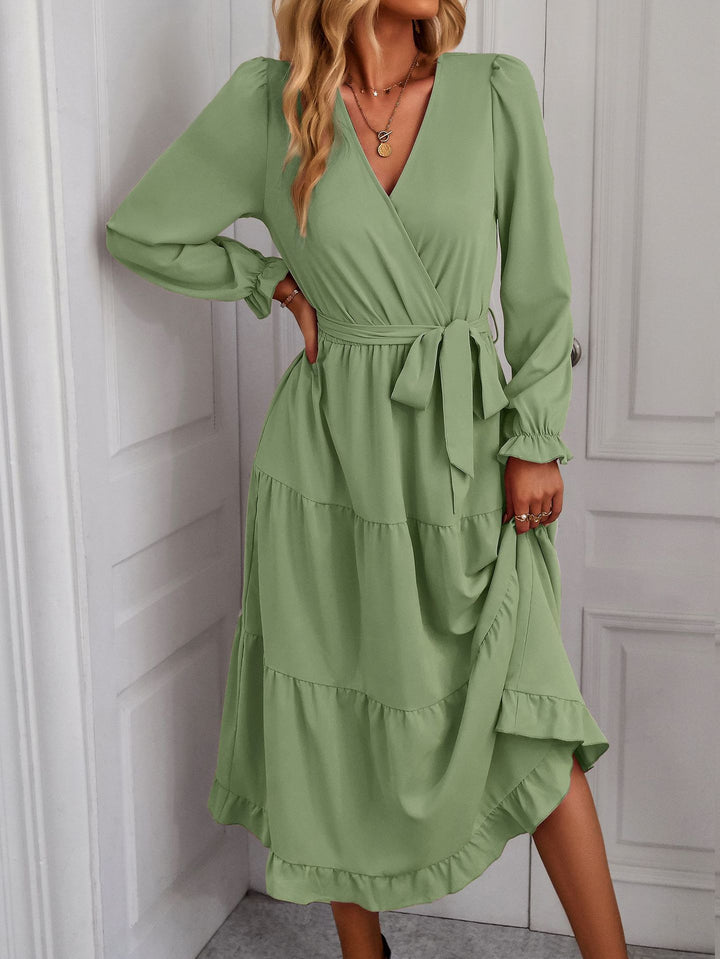 Damer Wrapklänning med Volangärmar och Elegant Snitt Mirla-Eva Jonsson