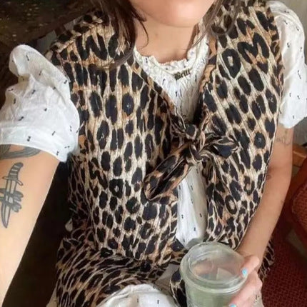 Damer ärmlös topp med charmig knytning och moderiktig leopardmönster Mirla-Eva Jonsson