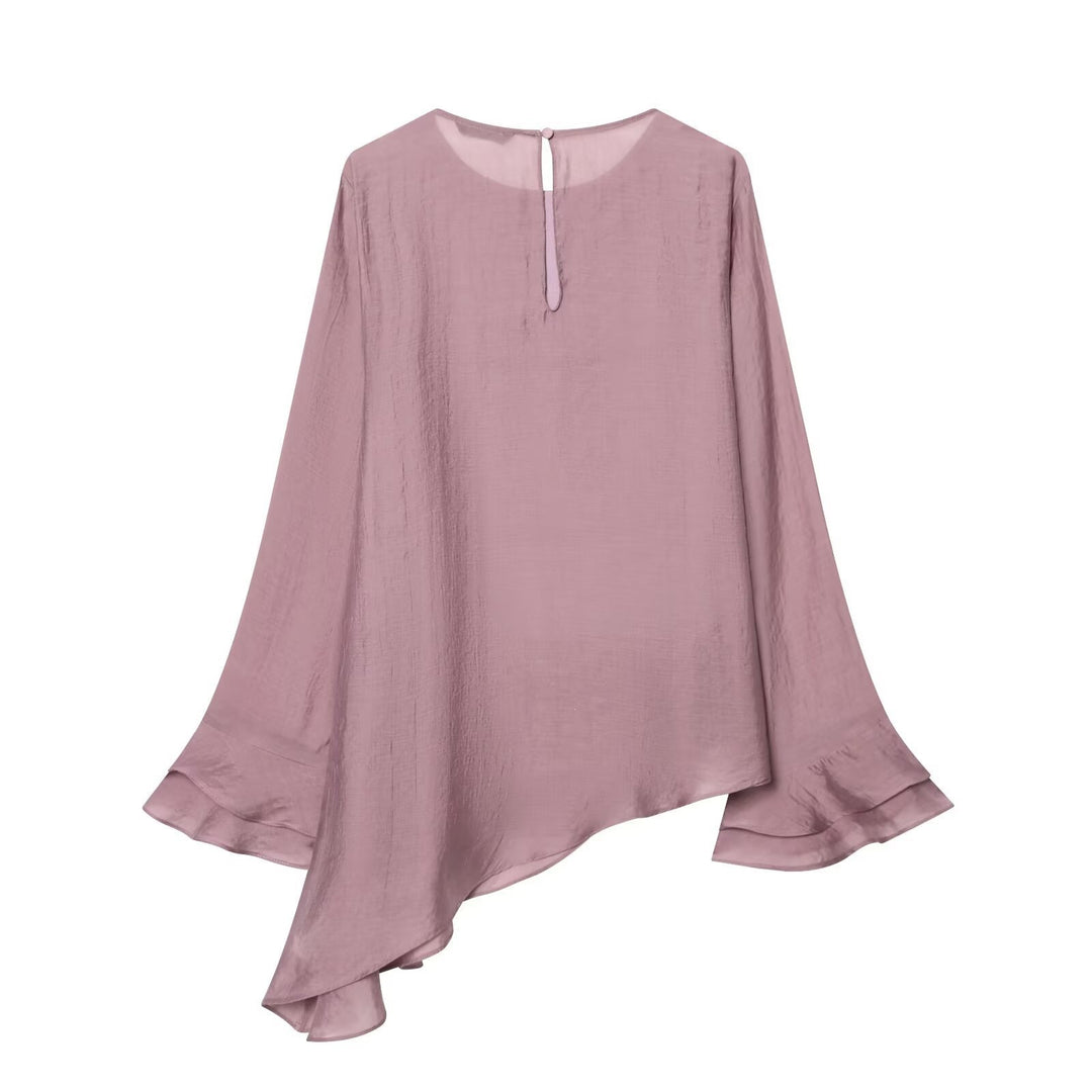 Damer asymmetrisk blus med volangdetaljer och elegant fall Mirla-Eva Jonsson