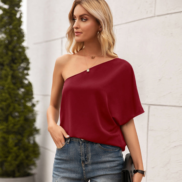 Damer asymmetrisk blus t-shirt med en avslappnad skärning och elegant design Eva Jonsson-Eva Jonsson