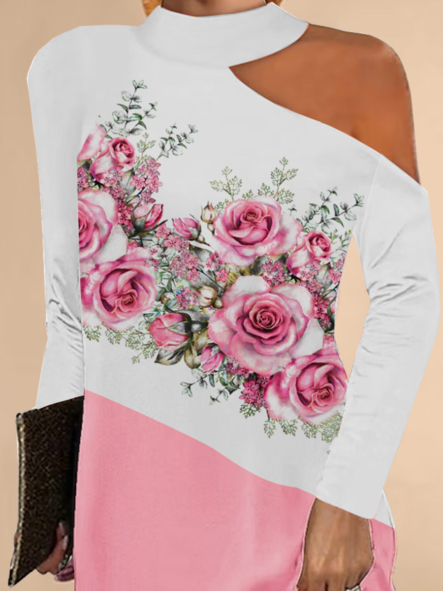 Damer asymmetrisk blusklänning med blommönster och elegant halslinning Mirla-Eva Jonsson