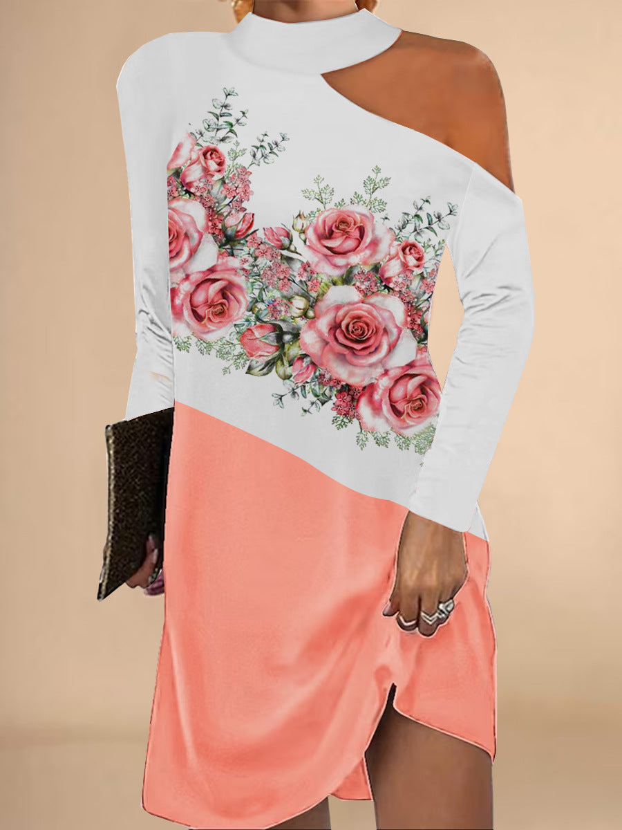 Damer asymmetrisk blusklänning med blommönster och elegant halslinning Mirla-Eva Jonsson