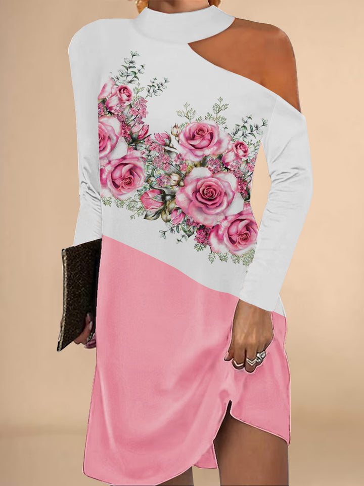 Damer asymmetrisk blusklänning med blommönster och elegant halslinning Mirla-Eva Jonsson