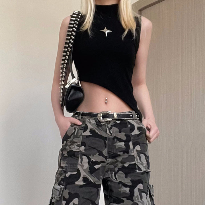 Damer asymmetrisk crop-top med modern design och dekorativa detaljer Mirla-Eva Jonsson