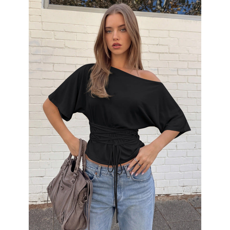Damer asymmetrisk crop-top med vid passform och flödande ärmar Mirla-Eva Jonsson
