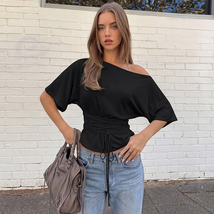 Damer asymmetrisk crop-top med vid passform och flödande ärmar Mirla-Eva Jonsson
