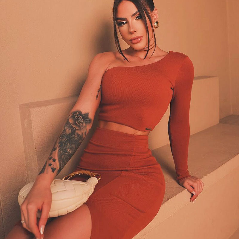 Damer asymmetrisk crop-top och figurnära minikjol-set Mirla-Eva Jonsson
