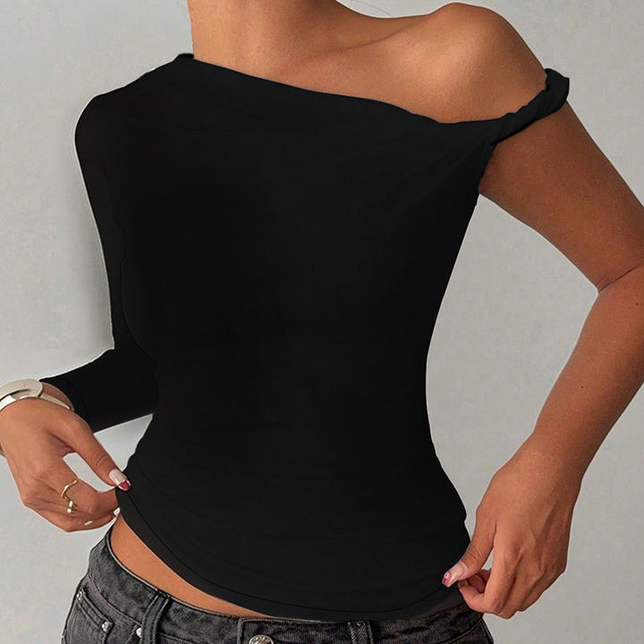 Damer asymmetrisk långärmad topp med off-shoulder design Mirla-Eva Jonsson