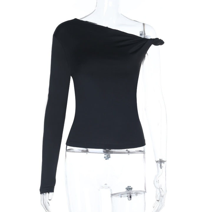 Damer asymmetrisk långärmad topp med off-shoulder design Mirla-Eva Jonsson