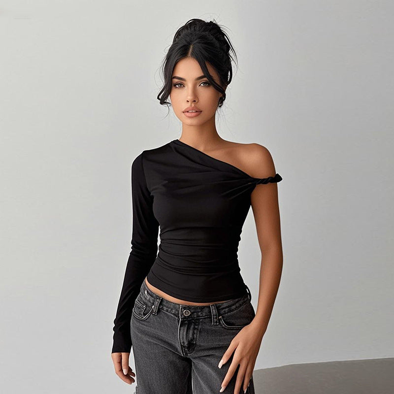Damer asymmetrisk långärmad topp med off-shoulder design Mirla-Eva Jonsson