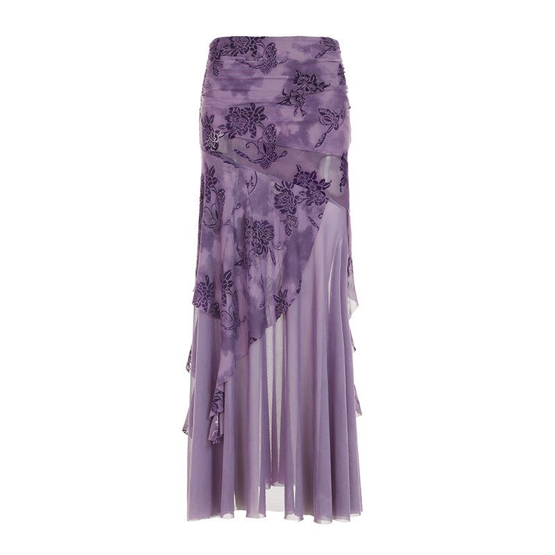 Damer asymmetrisk maxikjol med blomsterdetaljer och transparenta lager Mirla-Eva Jonsson