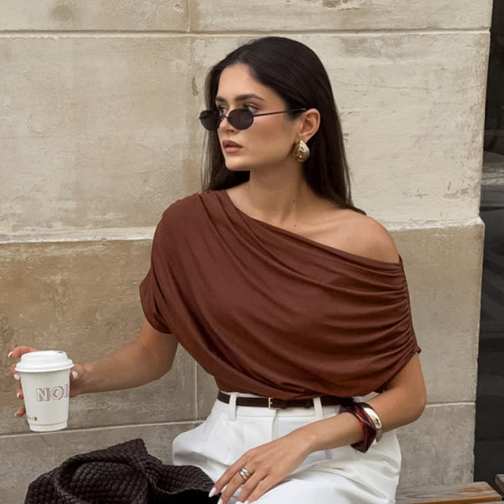 Damer asymmetrisk topp med avslappnad draperingsdesign Mirla-Eva Jonsson
