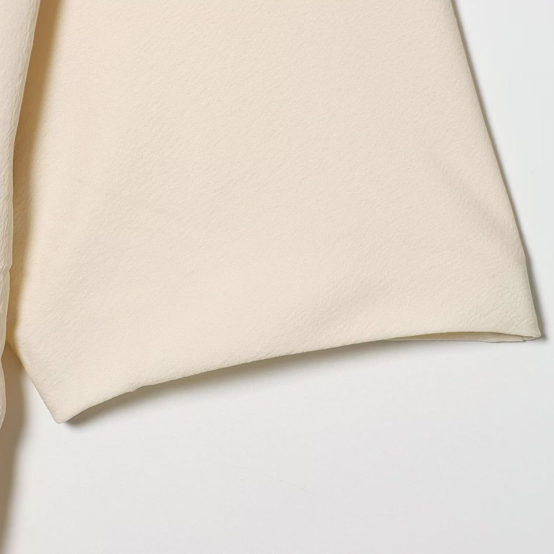 Damer asymmetrisk topp med elegant drapering Mirla-Eva Jonsson