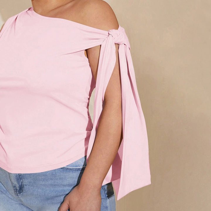 Damer asymmetrisk topp med knytbart design Mirla-Eva Jonsson