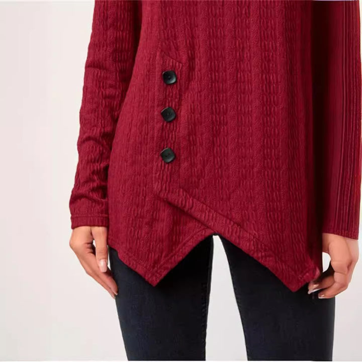 Damer asymmetriskt långärmad tröja med knapprad och strukturerad design Mirla-Eva Jonsson