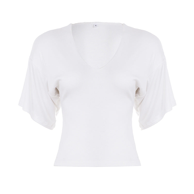 Damer avslappnad Cropped T-shirt med V-ringning och oversized ärmar Mirla-Eva Jonsson