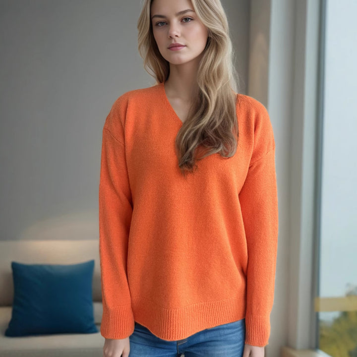 Damer avslappnad V-hals tröja med modern strukturdesign Mirla-Eva Jonsson