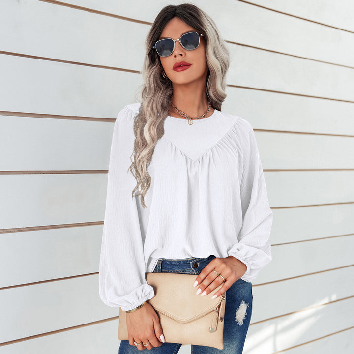 Damer avslappnad blus med ballongärmar och fin struktur Mirla-Eva Jonsson