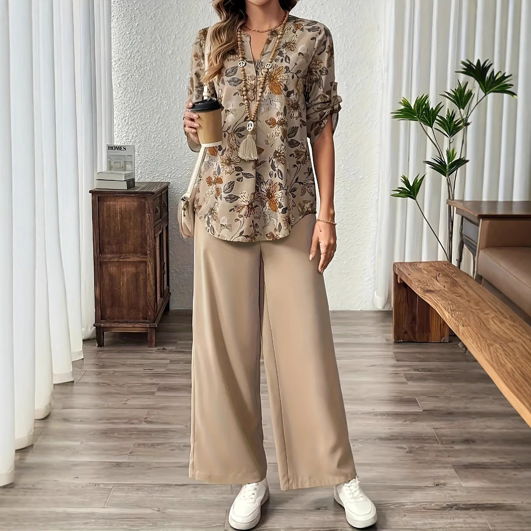 Damer avslappnad blus med blommigt mönster och vida byxor Mirla-Eva Jonsson