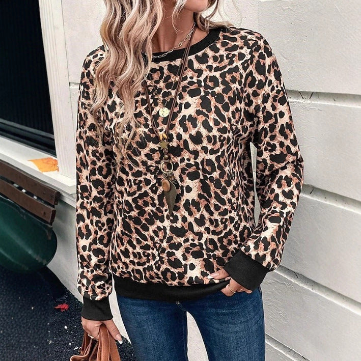 Damer avslappnad djurtryck sweatshirt med rundhals och elastiska muddar Mirla-Eva Jonsson