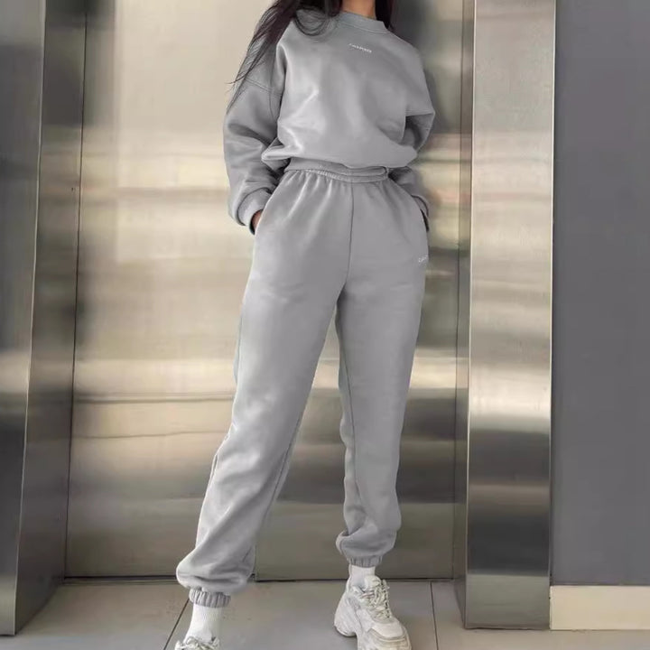 Damer avslappnad fleece joggingset med elastisk midja och avslappnad passform Mirla-Eva Jonsson