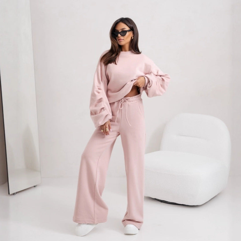 Damer avslappnad fritidsdräkt med vida byxor och en oversized sweatshirt Eva Jonsson-Eva Jonsson