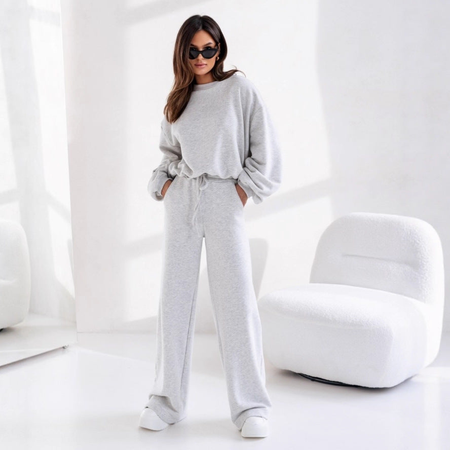 Damer avslappnad fritidsdräkt med vida byxor och en oversized sweatshirt Eva Jonsson-Eva Jonsson