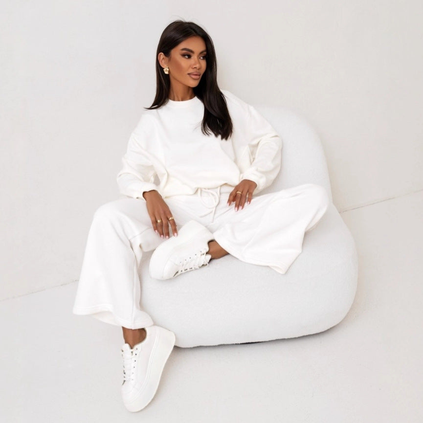 Damer avslappnad fritidsdräkt med vida byxor och en oversized sweatshirt Eva Jonsson-Eva Jonsson