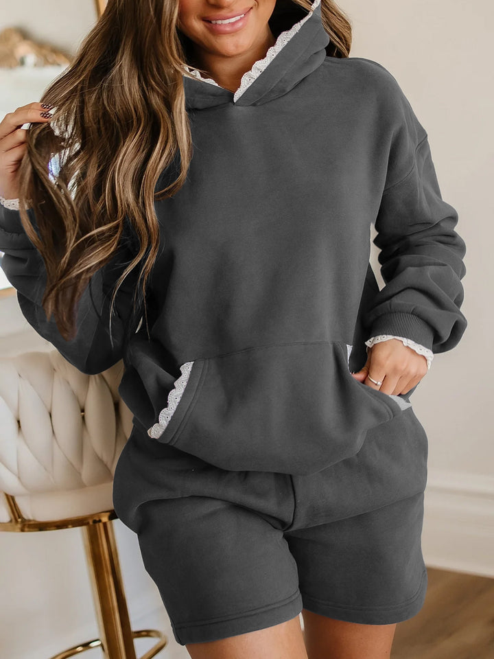 Damer avslappnad hooded blus med spetsdetaljer Mirla-Eva Jonsson