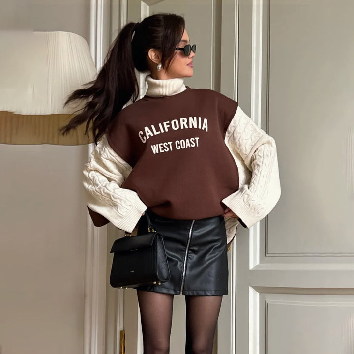 Damer avslappnad hoodie med hög krage och moderiktig text Mirla-Eva Jonsson