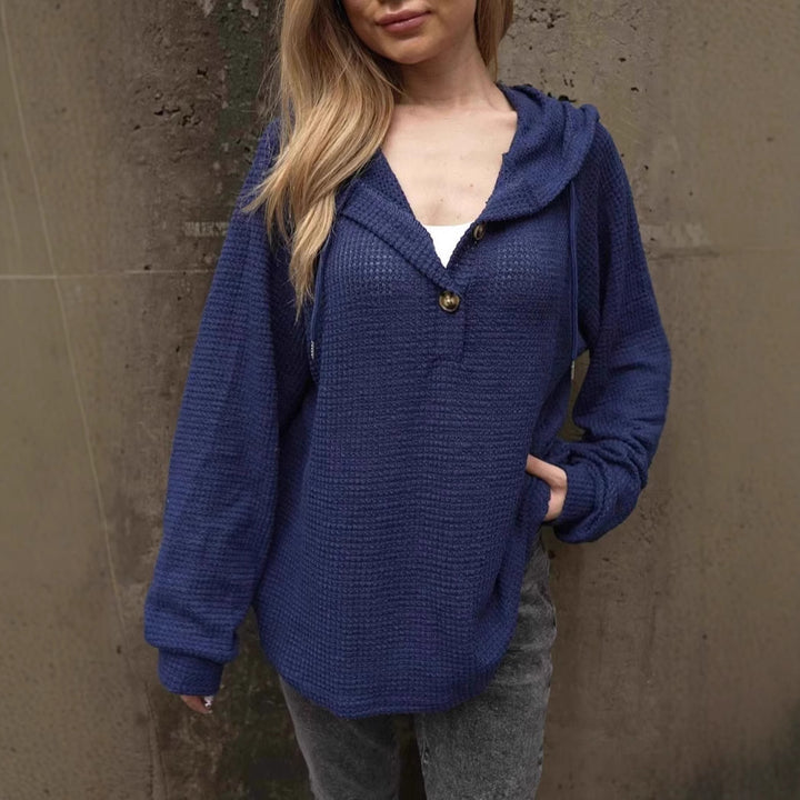 Damer avslappnad hoodie med knappdetaljer Mirla-Eva Jonsson