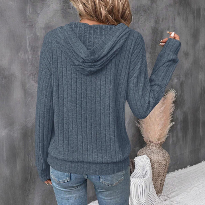 Damer avslappnad hoodie med strukturerat våffelmönster och praktiska fickor Mirla-Eva Jonsson